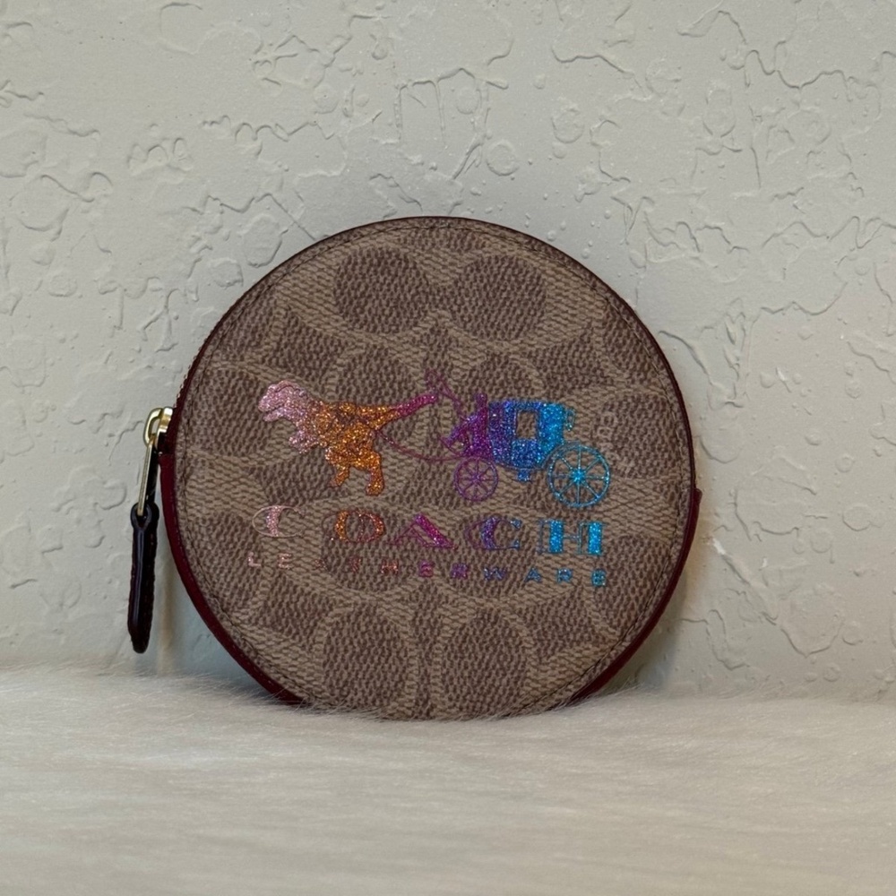 Coach Round Coin Case In Signature Canvas With Rexy And Carriage
